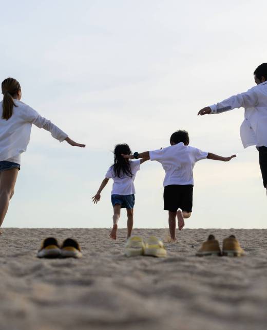 Happy Asian family travel on beach on holiday, Tropical beach vacation Happy Asian family travel together on beach on holiday, Family with beach travel, People enjoying with holiday vacation, Tropical beach vacation